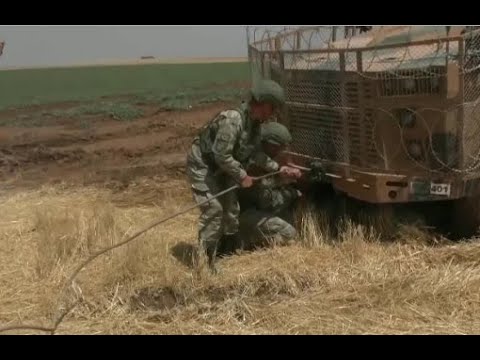Turkish armored vehicle stuck in the mud during Russian Turkish joint patrol in Northeast