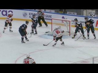 Olkinuora deflects it with his